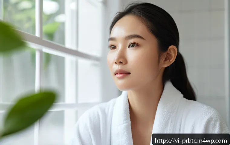 프로바이오틱 스킨케어로 팬데믹 이후 피부 관리하기 - A close-up portrait of a young Vietnamese woman with clear, glowing skin applying a lightweight prob...